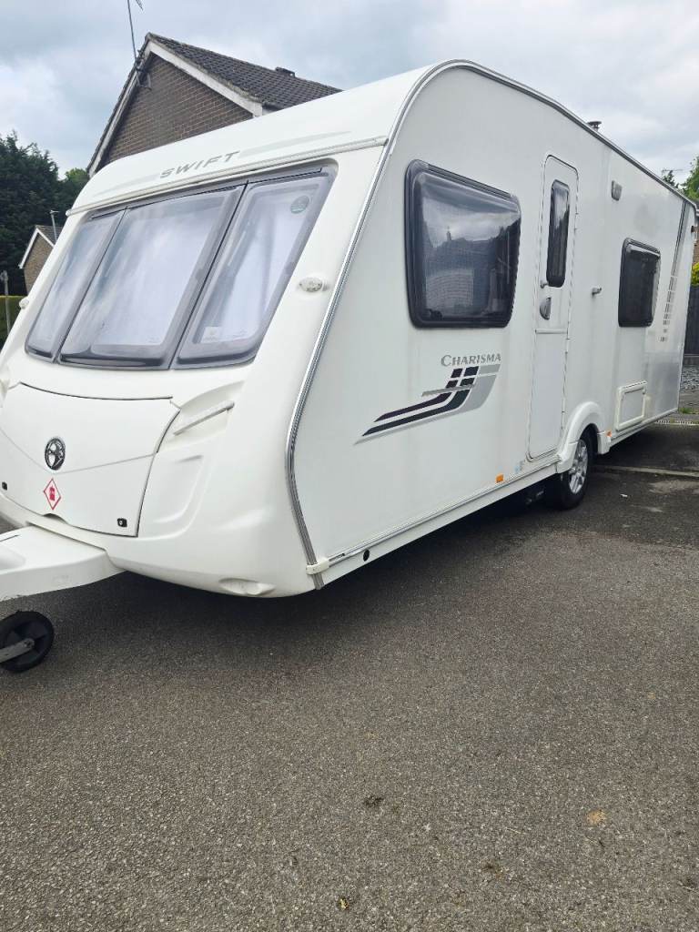 2010 Swift Charisma 550 4 berth fixed bed touring caravan motormover awning