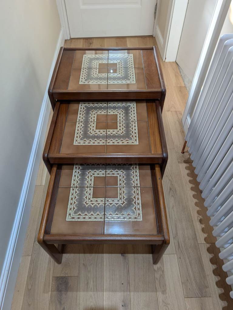 vintage mid-century modern nesting tables with tiled tops and teak frames