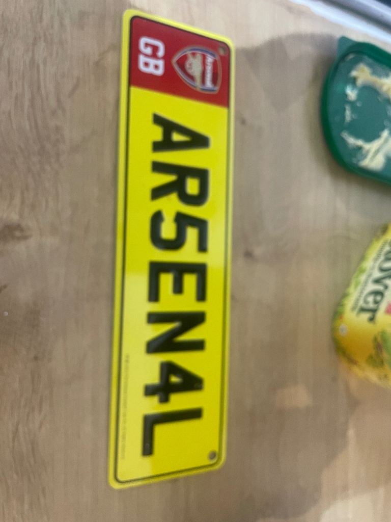 Small metal arsenal sign 
