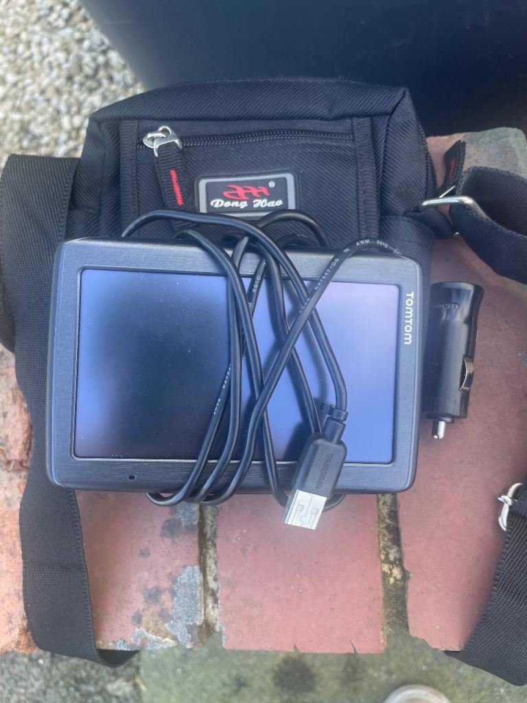 TomTom GPS Device with Bag and Charger – Good Condition