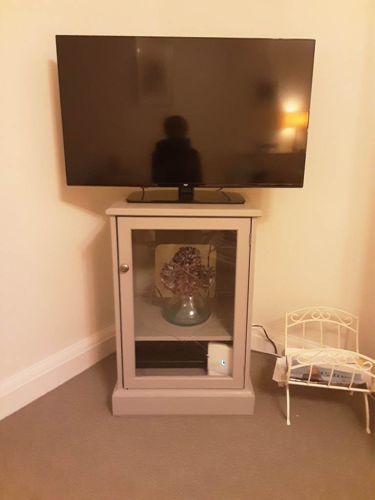 FREE TV/display cabinet.  Grey glass fronted. 