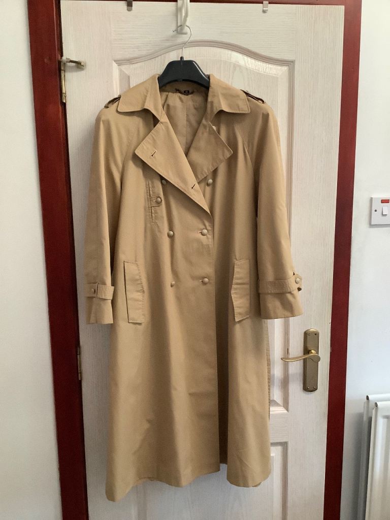 Ladies Raincoat, size 14, like new.