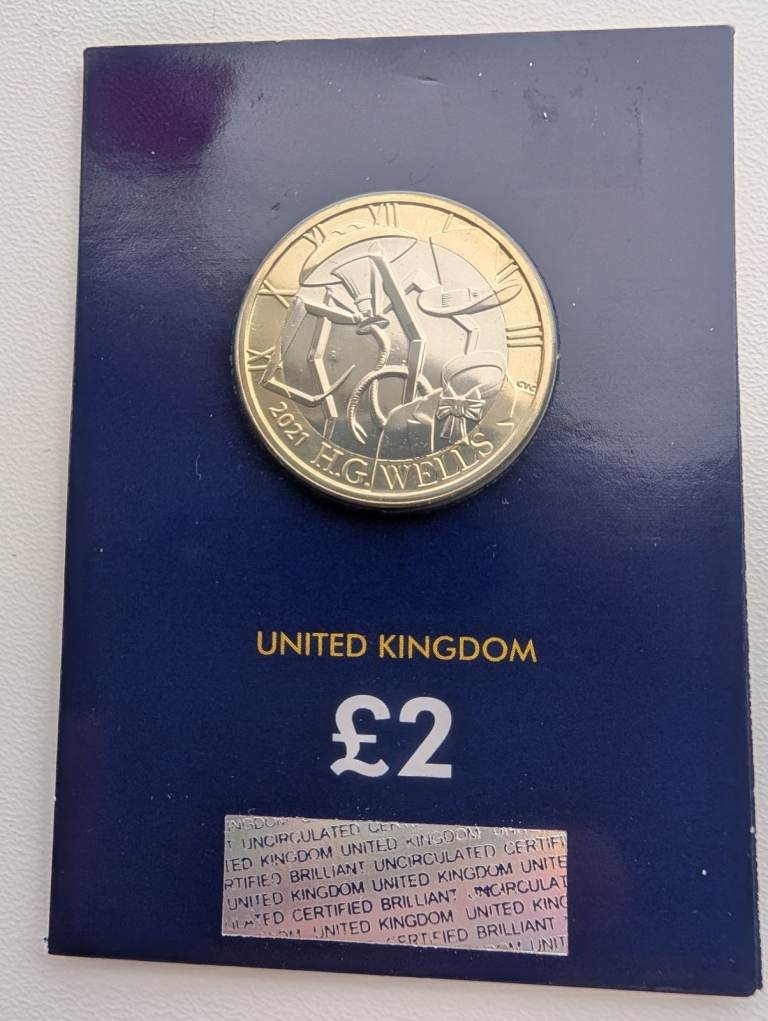 £2 coin - HG Wells BUNC Changer Checker coin