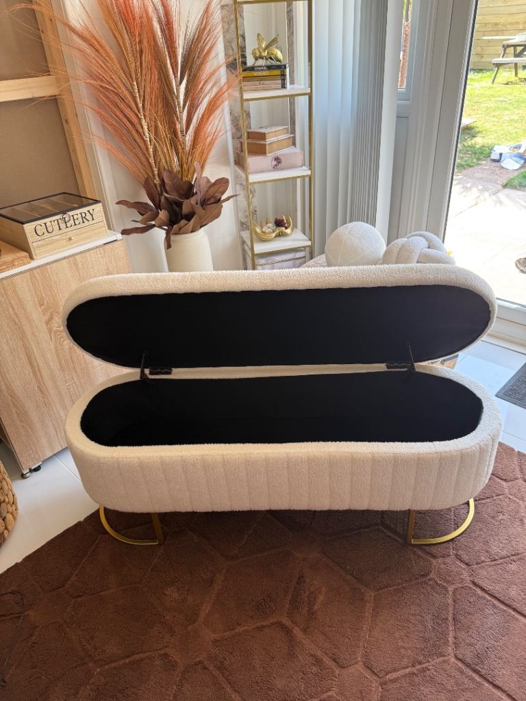 Off white oval ottoman boucle 