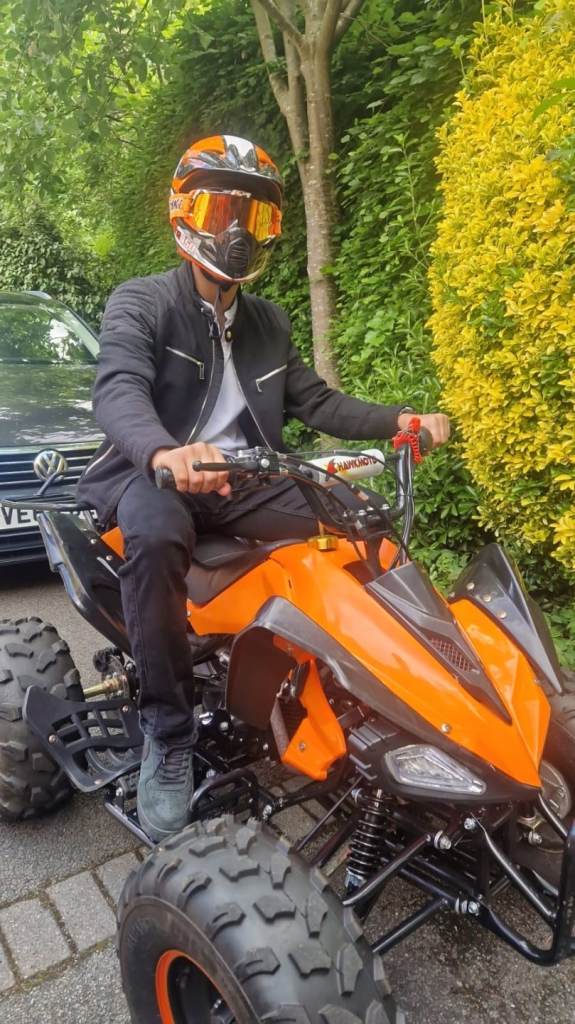 Orange and black 125cc quadbike
