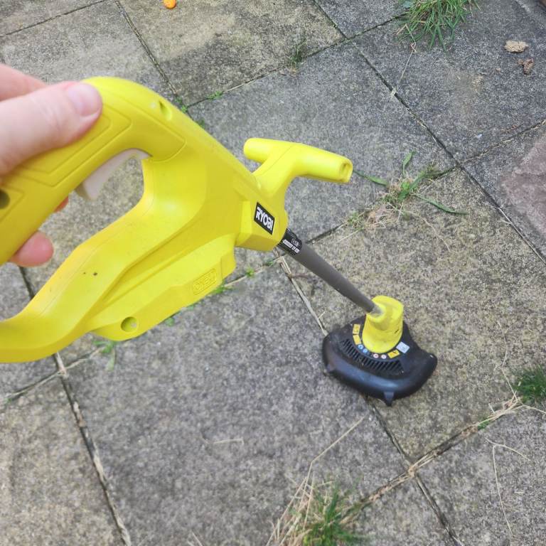 Ryobi Cordless Grass Trimmer – Good Condition, Yellow