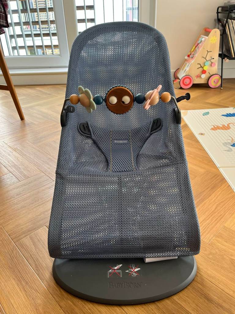 Bouncer Baby Bjorn with a toy