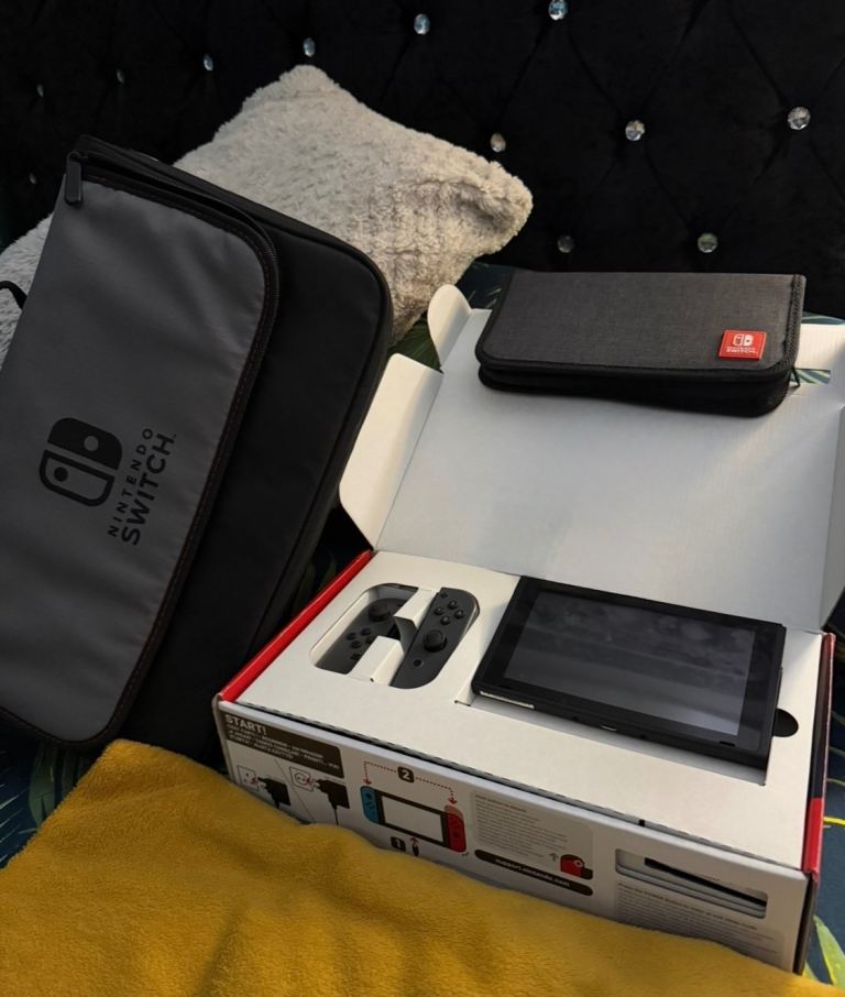 Nintendo Switch Console with Joy-Cons and Carry Cases – Good Condition