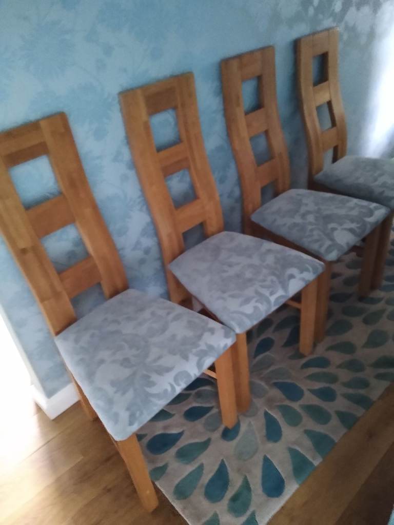 Solid oak dining table and 4 chairs