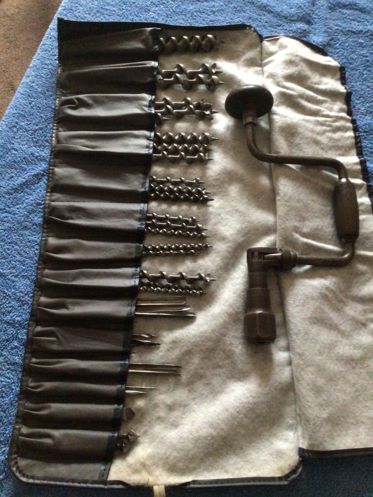 10” Wheel brace and 32 assorted bits plus roll.