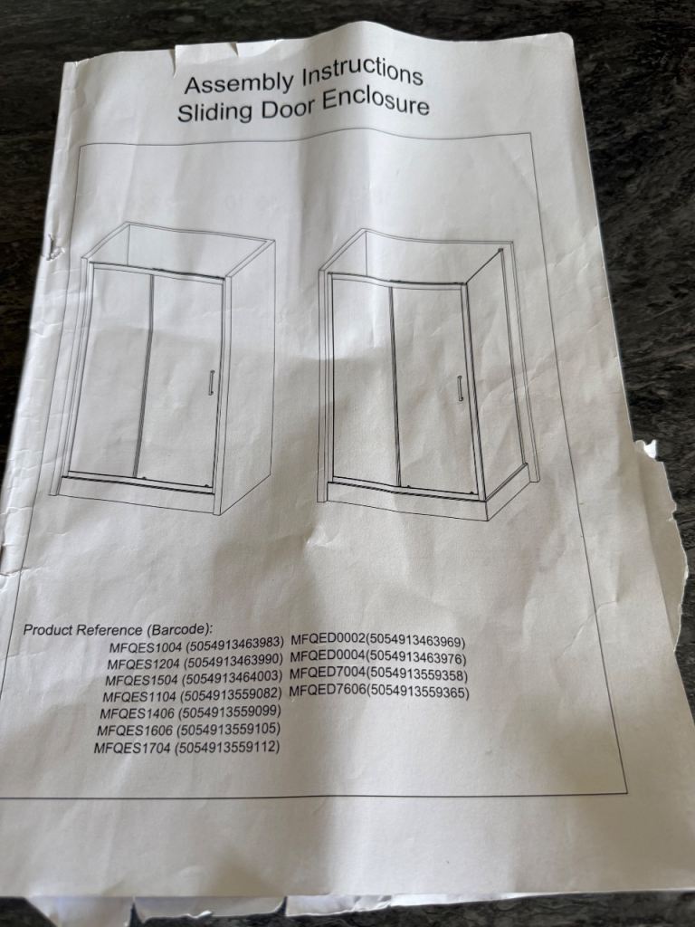 Black sliding door walk in shower 