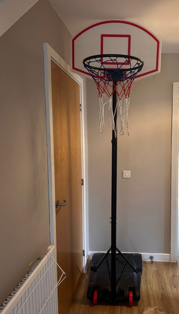 Adjustable basketball hoop