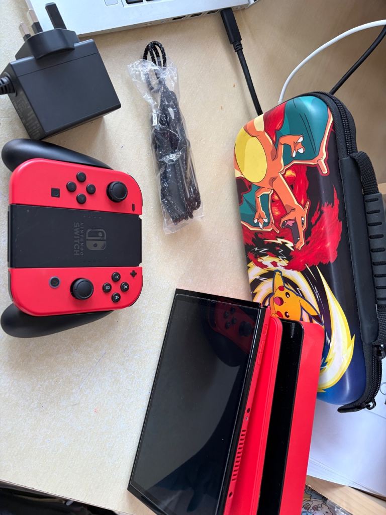 nintendo oled switch with super mario game 