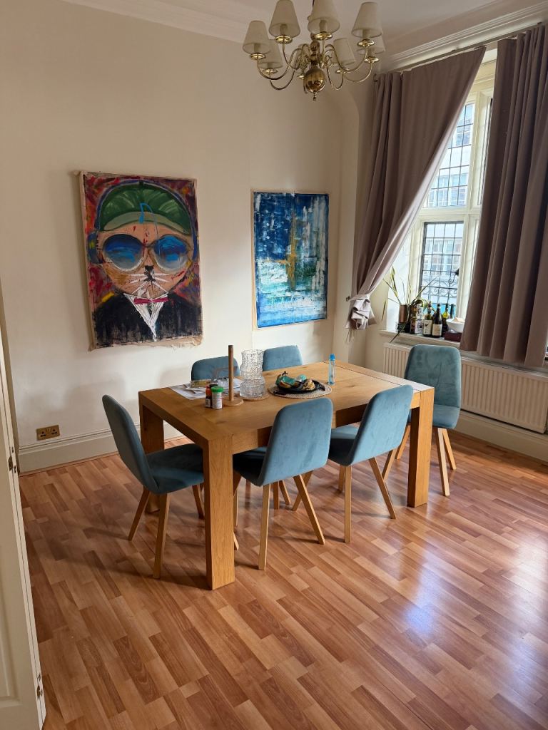 Six blue/teal dining chairs / Wooden dining table