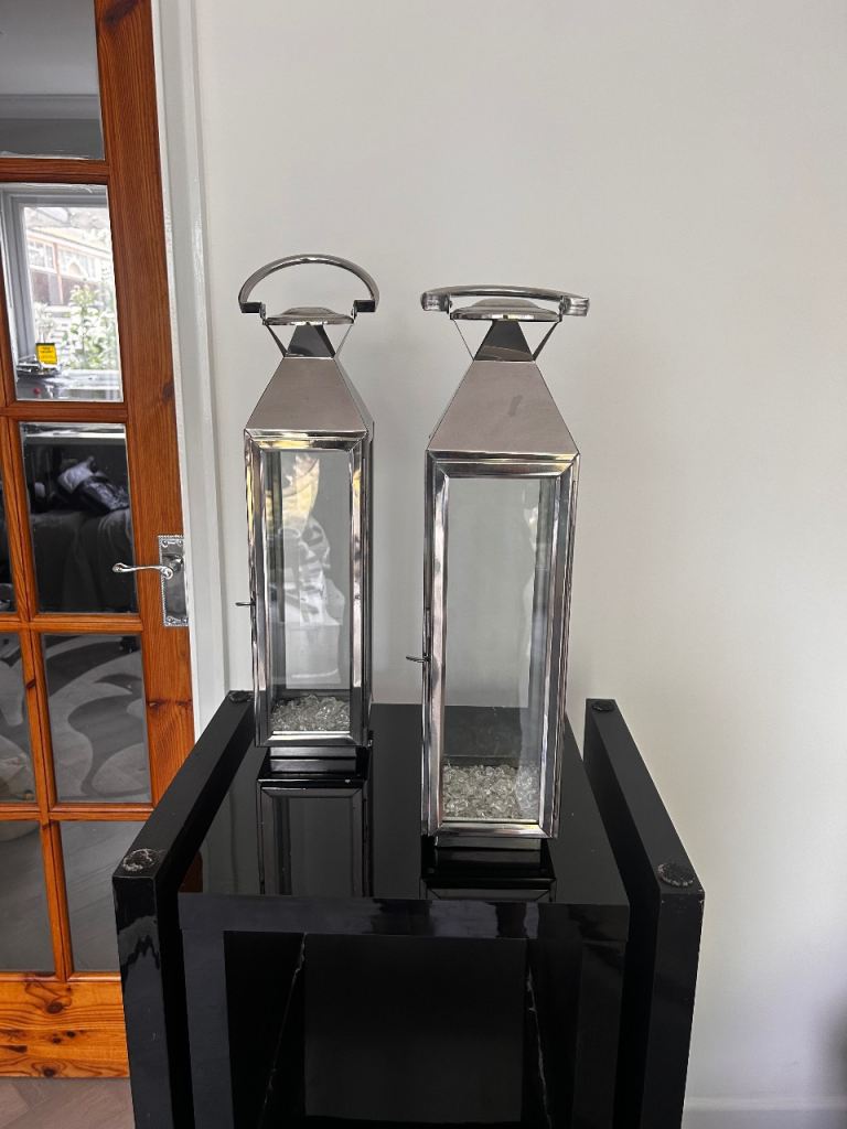 Pair Of Tall Polished Stainless Steel Candle Lanterns