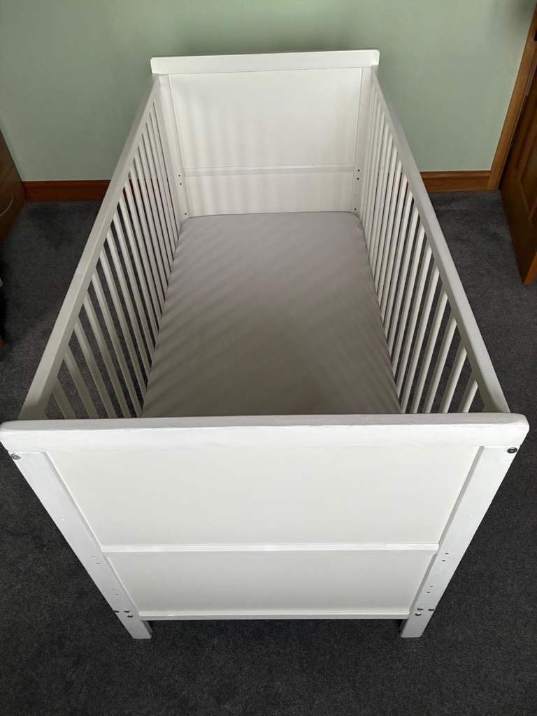 Cot with  mattress and bumper. 