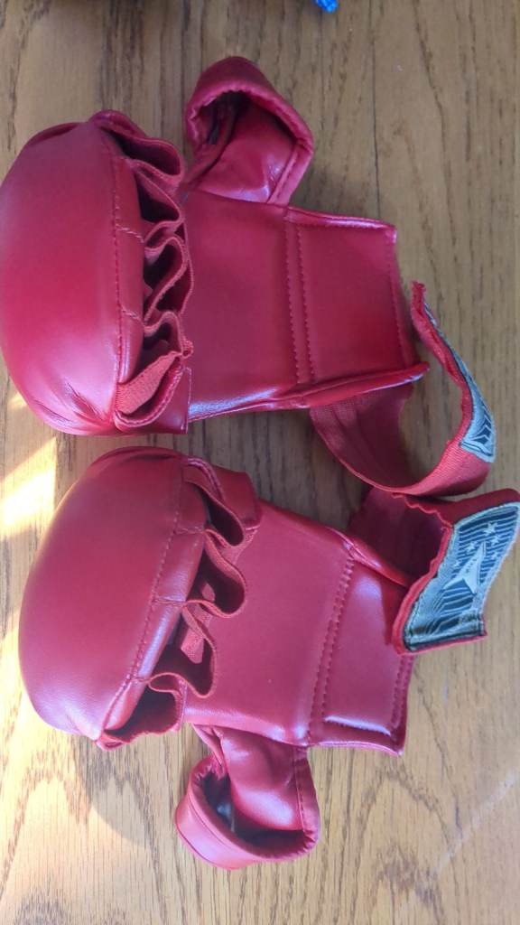 In good condition Martial Arts Protective Head Gea Red Size S, Blue size S age 