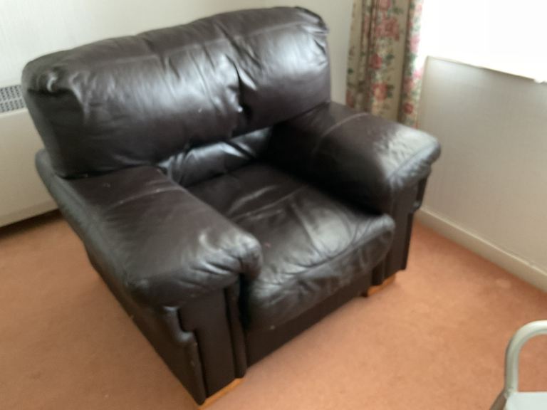A comfy brown leather armchair