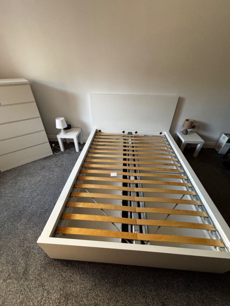 IKEA double bed with storage drawers underneath 