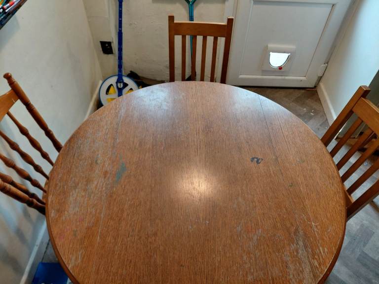 Wooden table and 4 chairs