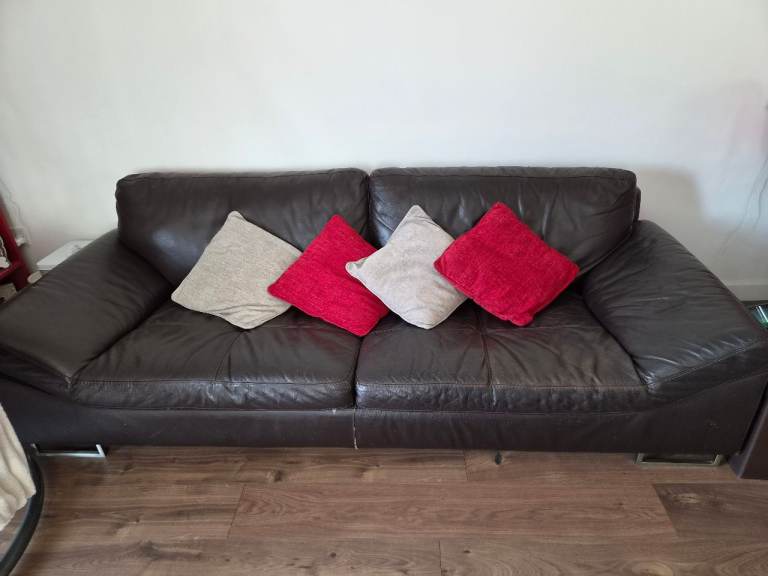 Brown leather 4 + 3 seater sofa & pouffe