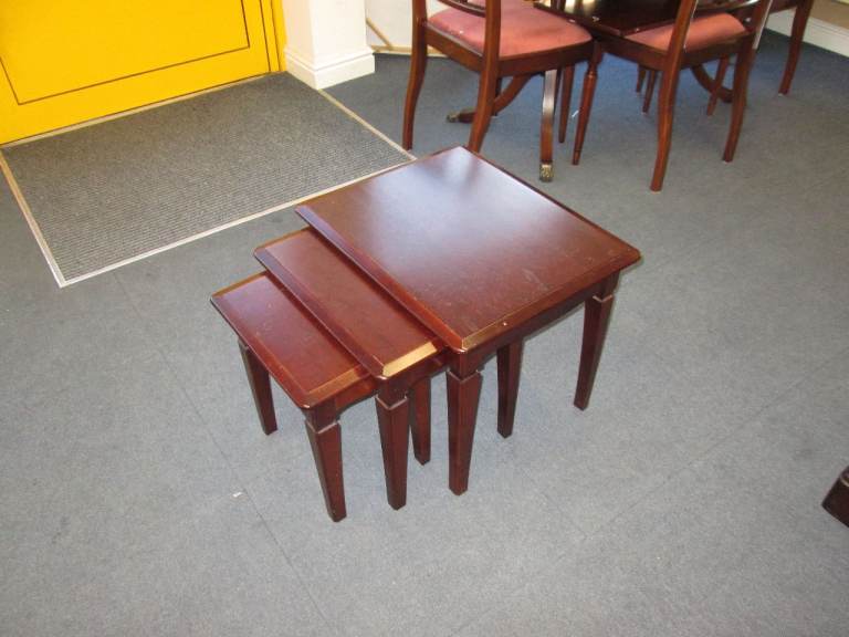 image for NEST OF 3 MAHOGANY COFFEE TABLES at HAVEN TRUST CHARITY SHOP