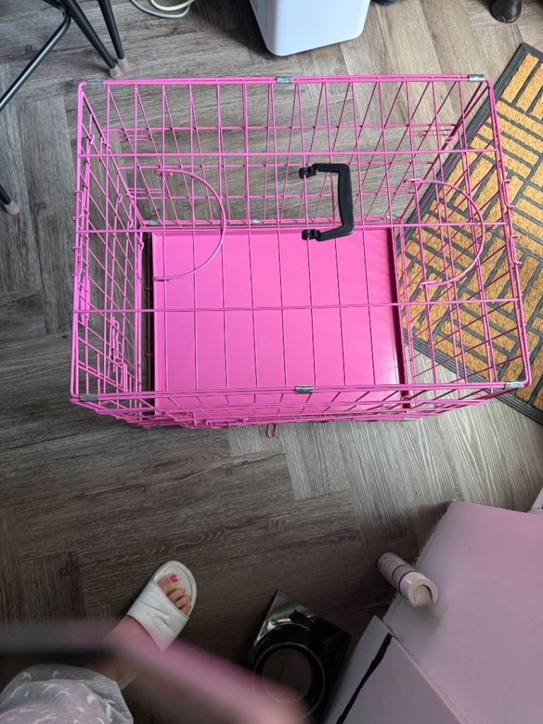 Nearly new pink dog cage 