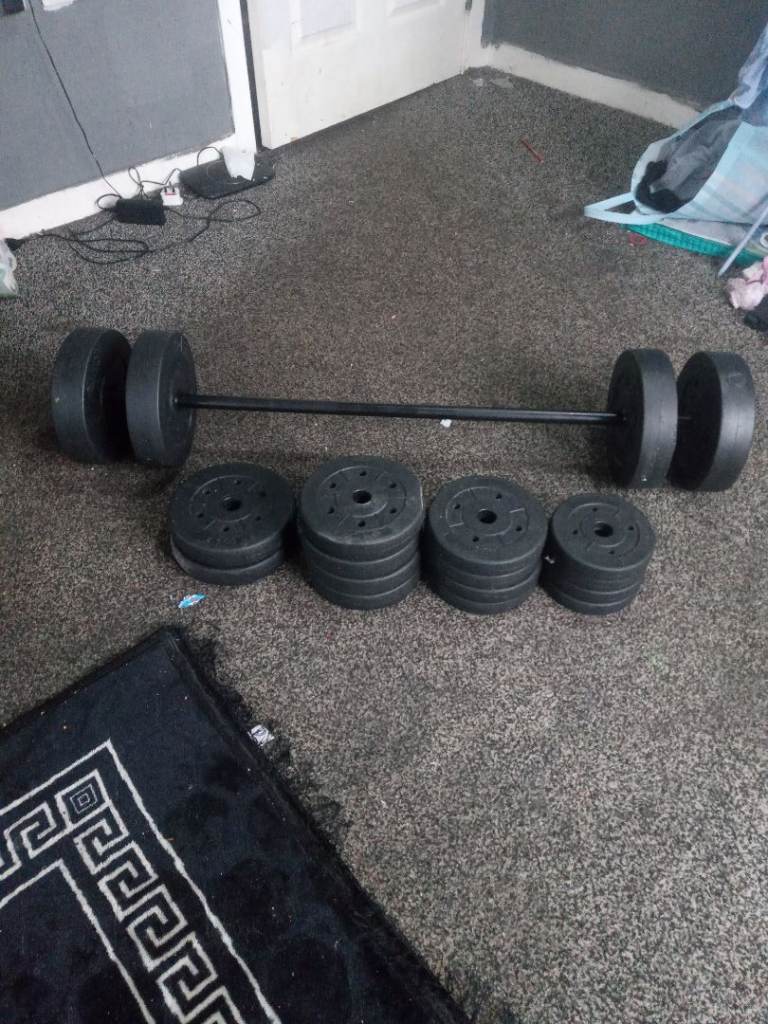 Weight bar plus 50 kg in weights 