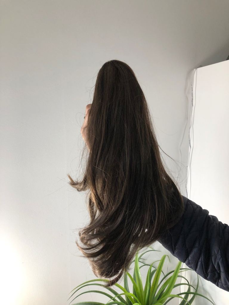 Clip on pony tail hair extension 