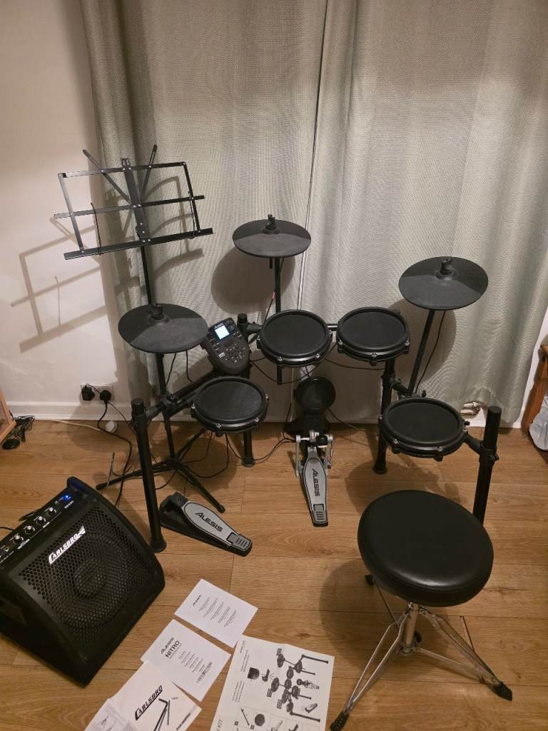 Alesis Nitro Electric Drum Kit with Carlsbro EDA 30W Amp