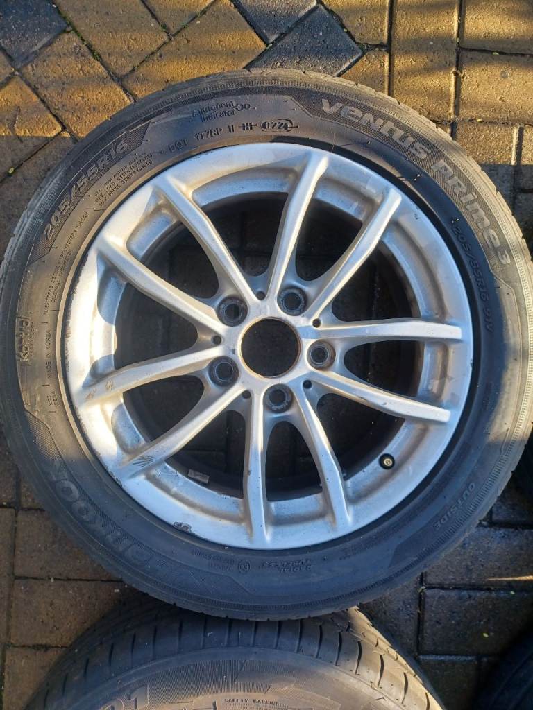 2 sets bmw alloy wheels for sale