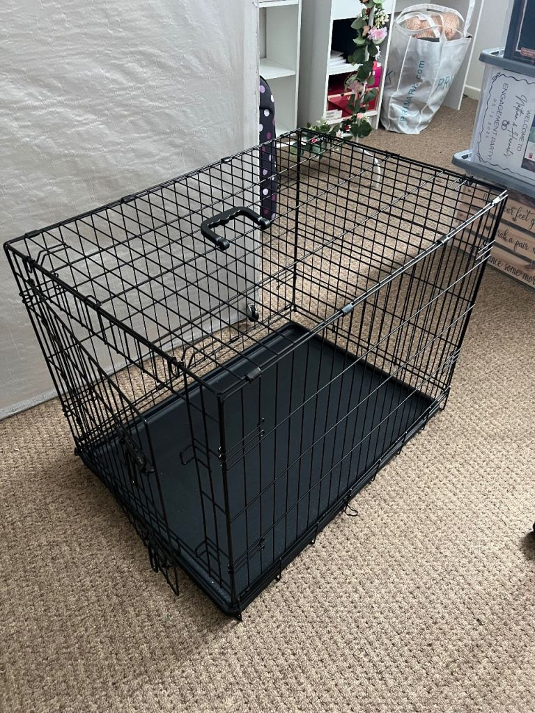 Medium dog crate with waterproof bed 