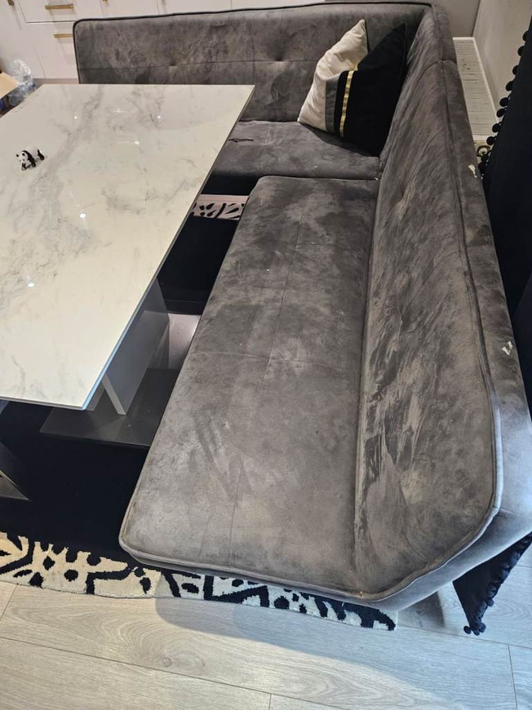 Table with corner chair, sofa and bench