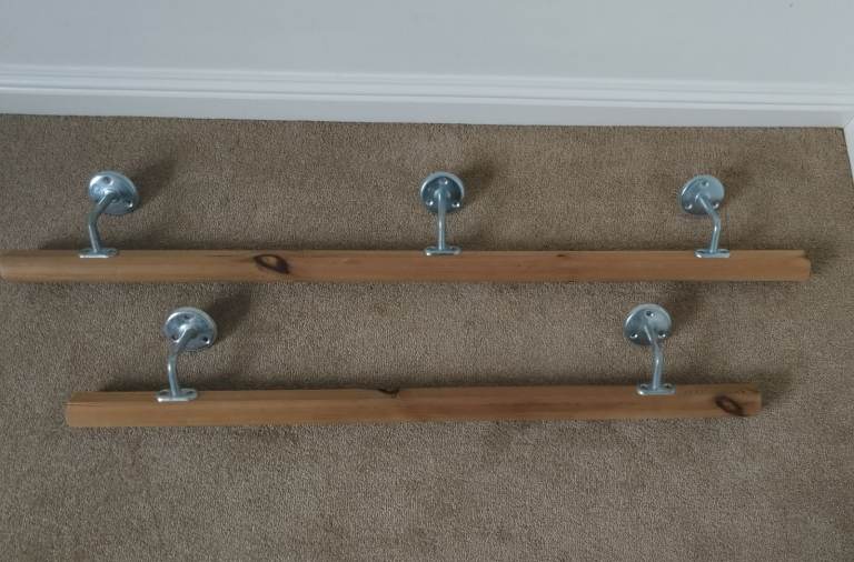 Pine mopstick handrails with brackets