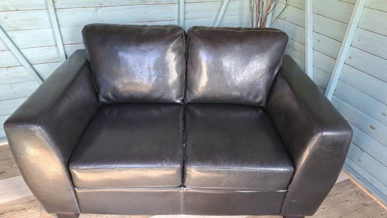 Black faux leather settee