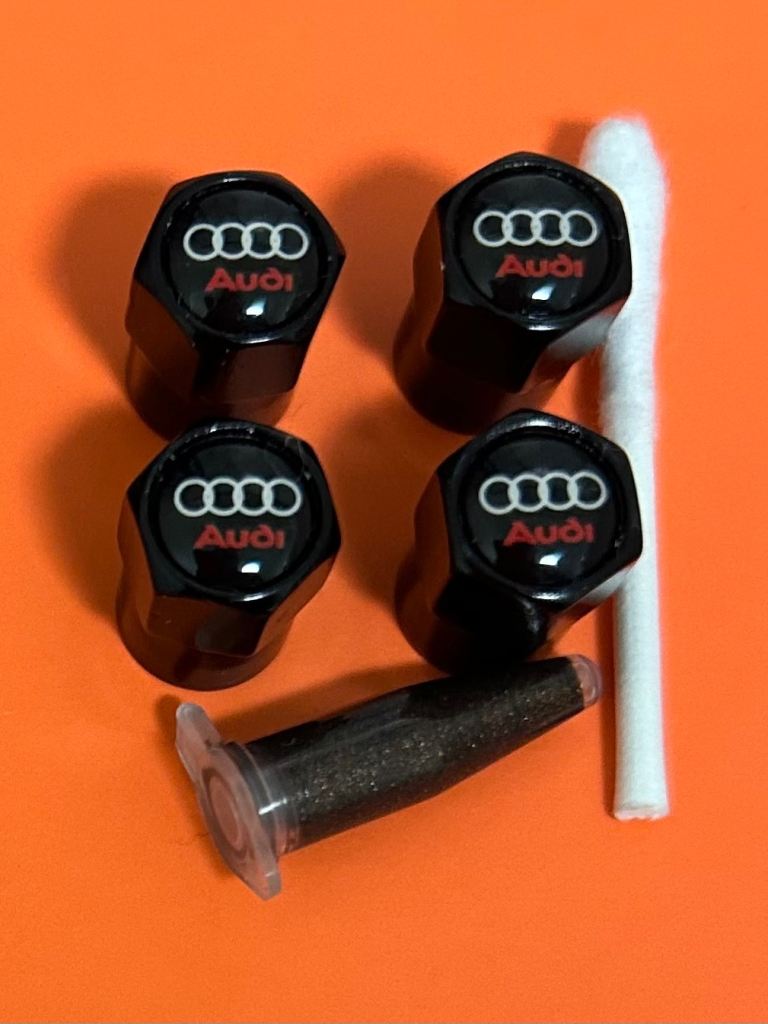 Audi Tyre valve caps with grease 