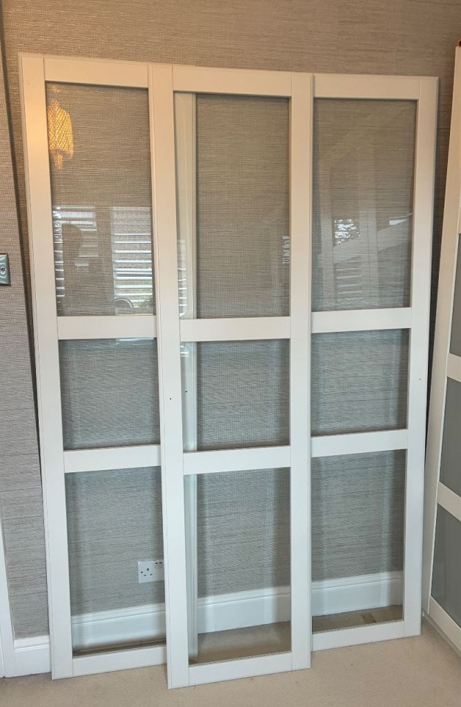 3 white Ikea wardrobe doors with bevelled glass