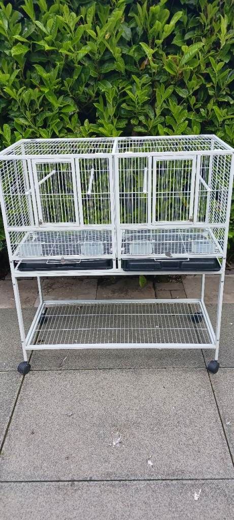 Large Bird Cage White 95L x 45W x 105H with trolley, under storage and wheels. 