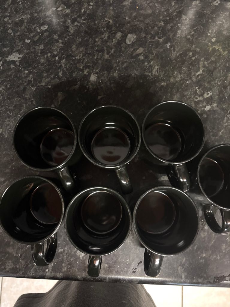 New seven black mugs