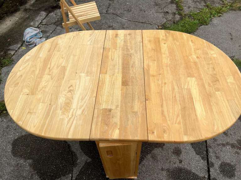 Extendable Table with incorporated fold up chairs