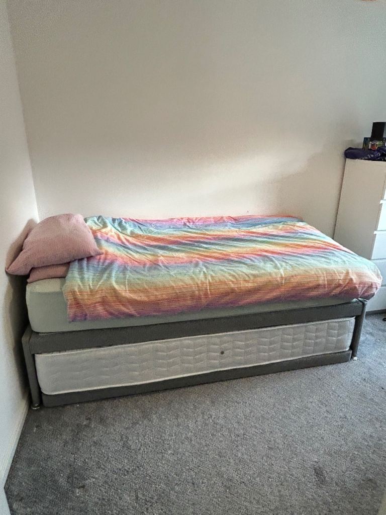 Guest bed single goes into double. 