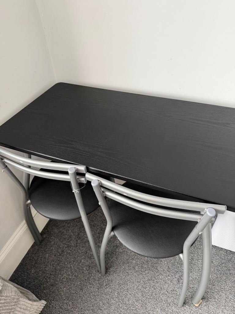 Table with 2 Chairs for sale 