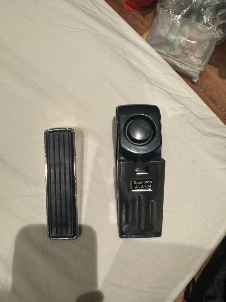 image for 2 door stops (one metal one plastic electric door alarm) 