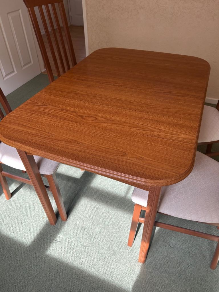 Dinning table and 4 chairs FREE