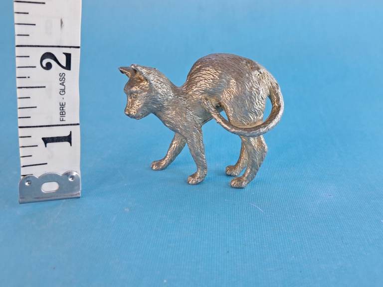 Vintage Miniature Pewter silver tone cat.  Good condition. As seen. 