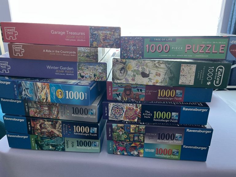 Collection of 1000 piece jigsaw puzzles