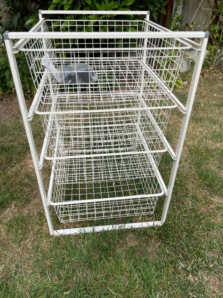 Ikea jonaxel storage unit with four baskets