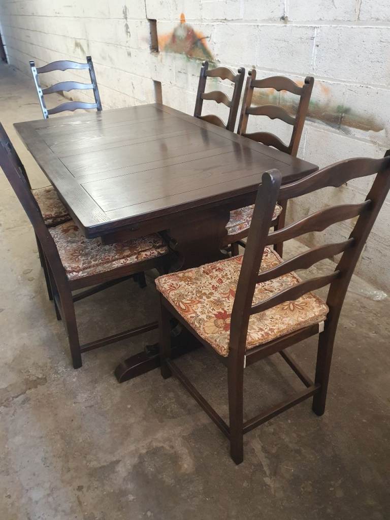 Ercol extendable dining table and 6 chairs 