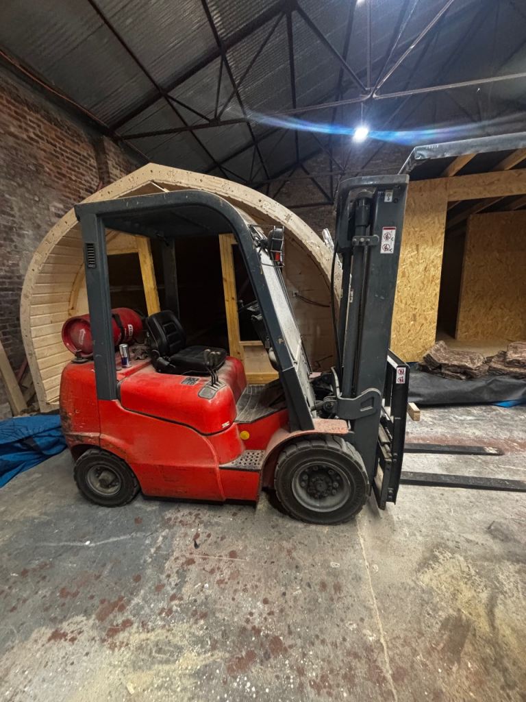 Forklift with extended forks 