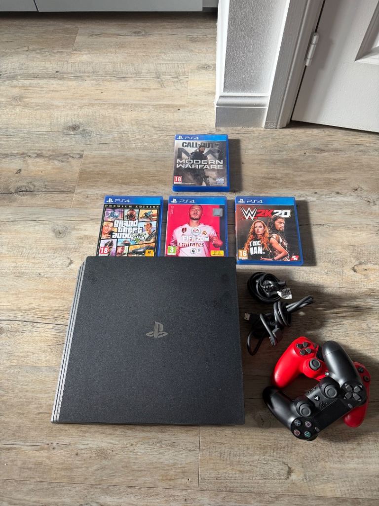 PS4 Pro 1TB Bundle – 2 Controllers + 4 Games
